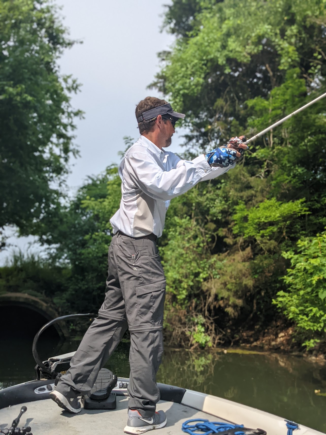 Adam Lazenby fishing outdoors, enjoying his favorite hobby and peaceful moments in nature